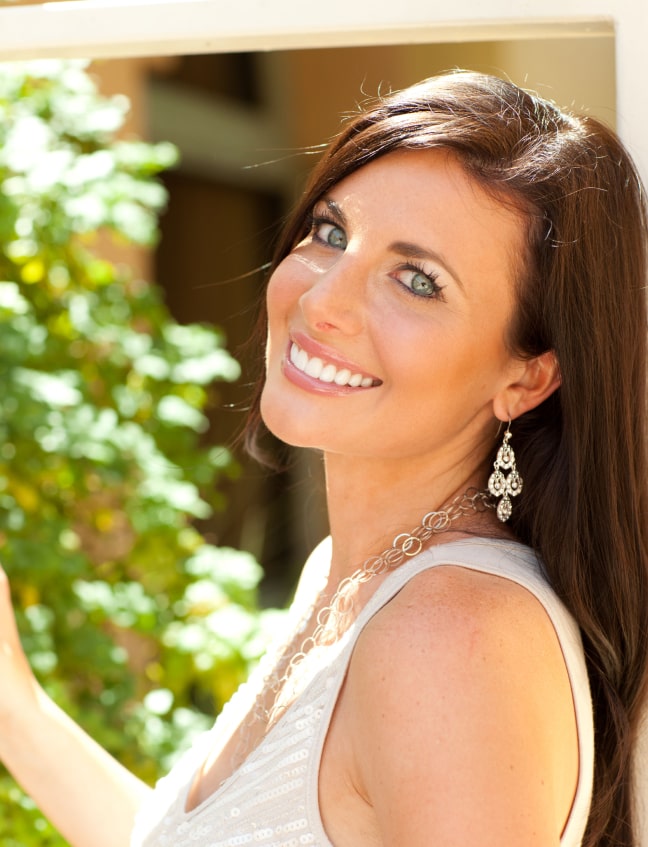 Photo of our client smiling on the nature